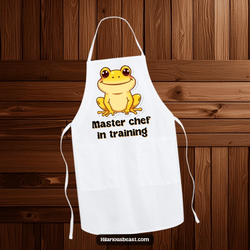 Funny yellow frog apron featuring a wide, goofy grin, perfect for cooking or baking with a side of silly fun. A functional funny accessory.