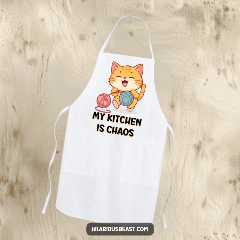 Funny apron showcasing a round orange cat joyfully chasing a bouncing yarn ball, a perfect funny gift.