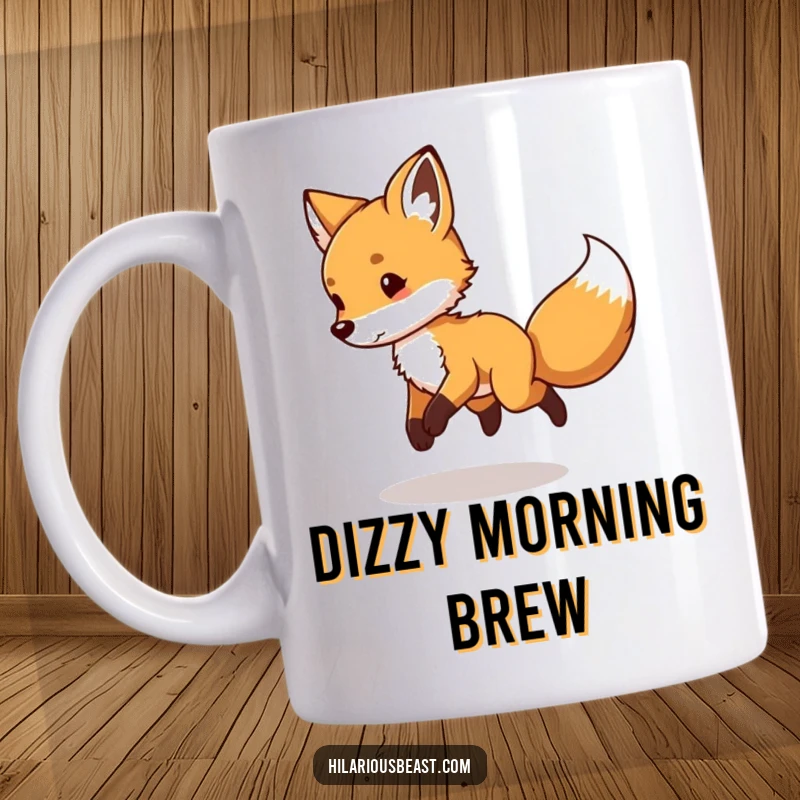Funny Fox Cub Mug: a cute, playful fox cub comically spinning in circles while chasing its own tail.