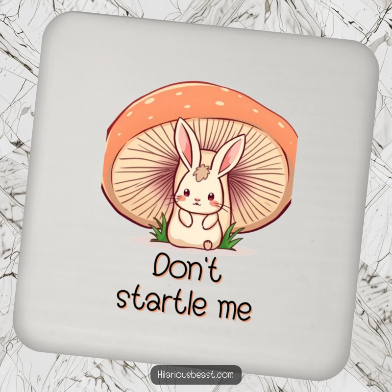 Funny drink coaster with a startled rabbit peeking from behind a wobbly mushroom, providing humorous surface protection.
