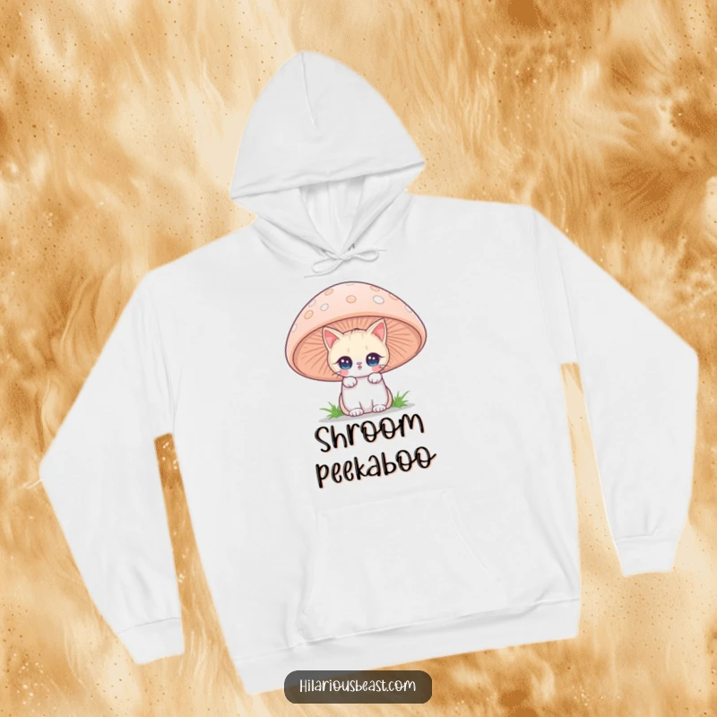 Cozy hoodie depicting a funny cat with twinkling eyes peeking from behind a giant mushroom, perfect for whimsical humor and a funny gift.