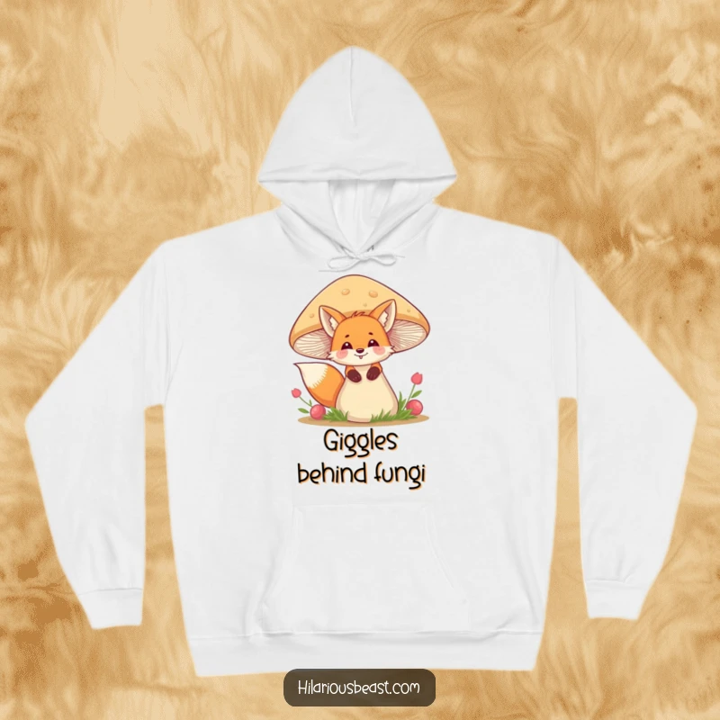 Funny fox hoodie with a giggling fox peeking mischievously from behind a large, wobbly mushroom, perfect for cozy fun.