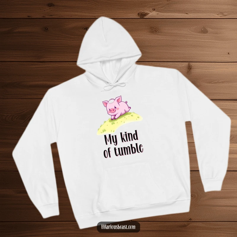 Funny purple piglet hoodie, a happy piglet gleefully rolling down a grassy hill, symbolizing carefree adventure and comfort.