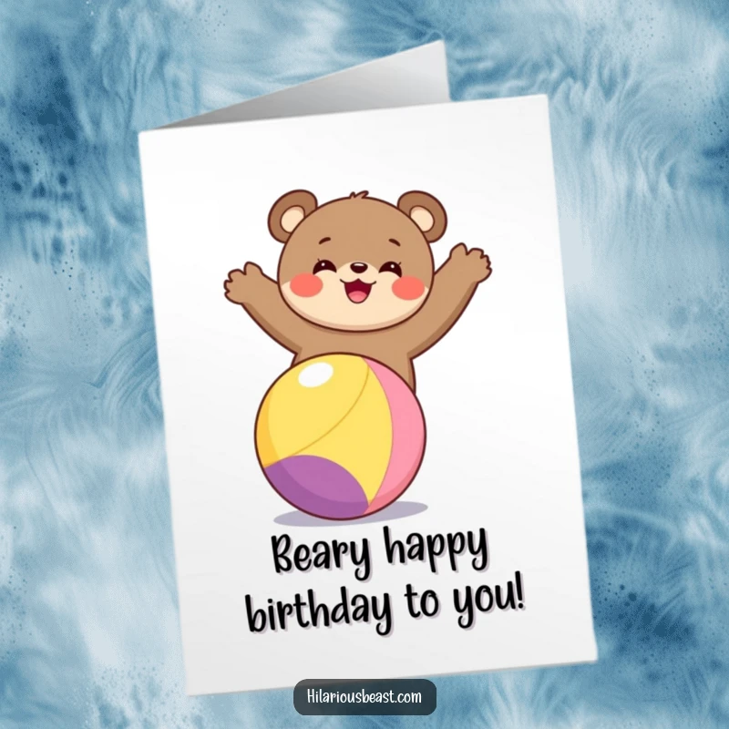 Funny Free Printable Birthday Card: A gleeful bear cub performs a delightful balancing act on a vibrant ball, radiating happiness.