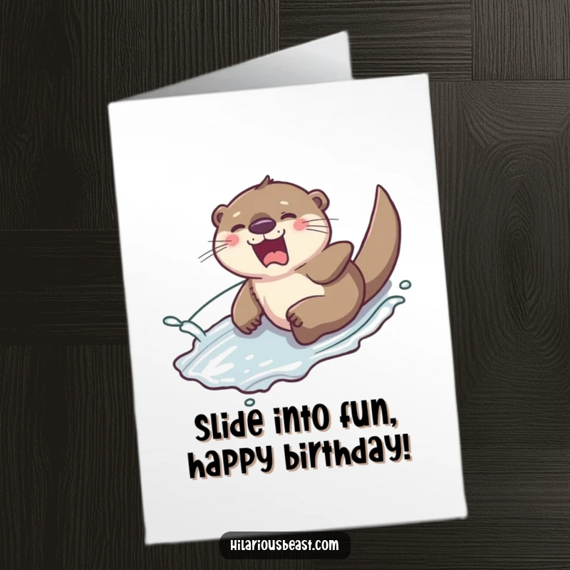 Funny Free Printable Otter Birthday Card: A giggling otter sliding down a hill, splashing water, perfect for birthdays.