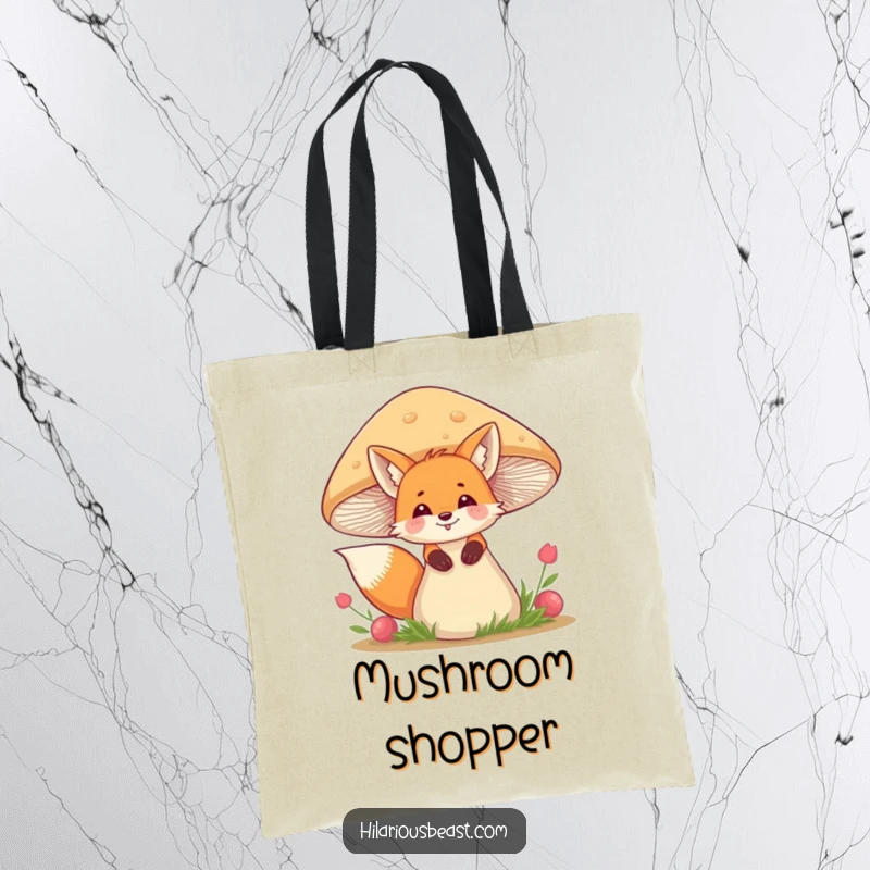 Funny fox tote bag showing a giggling fox peeking from behind a wobbly mushroom, adding whimsical charm to your carry-all.